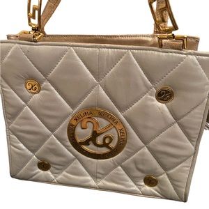 Xelina Genuine leather bag in beautiful Sea-foam color with gold decorations